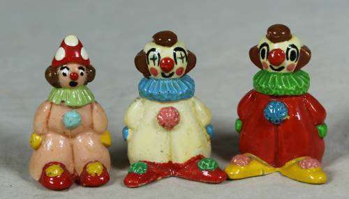Set of three very small clowns