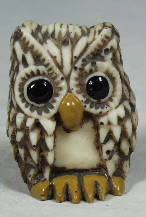 Miniature brown owl
