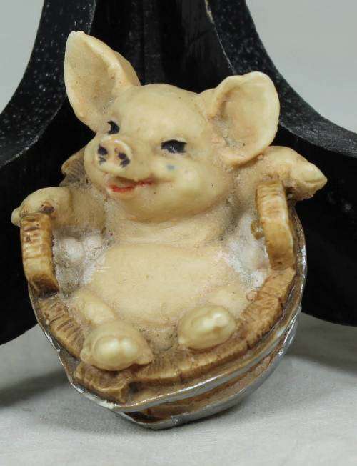 Miniature piggy in a barrel