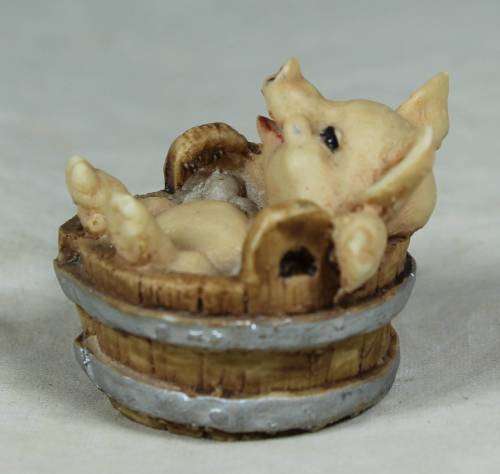 Miniature piggy in a barrel