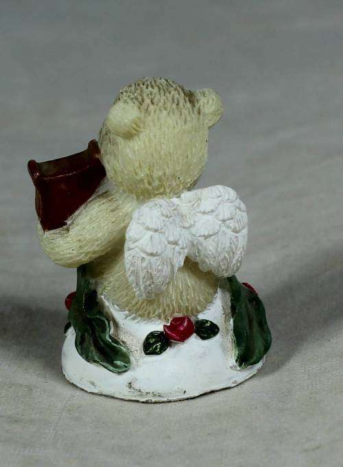 Miniature angel bear playing a harp