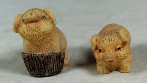 Miniature pair of piggy's