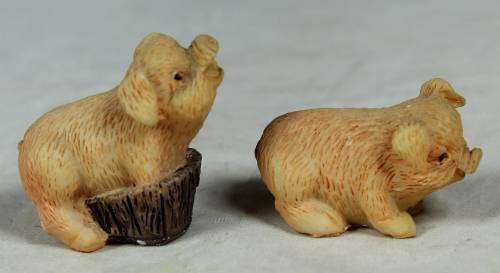 Miniature pair of piggy's