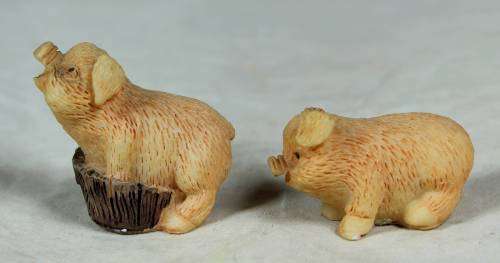 Miniature pair of piggy's