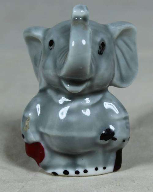 Miniature elephant standing to attention