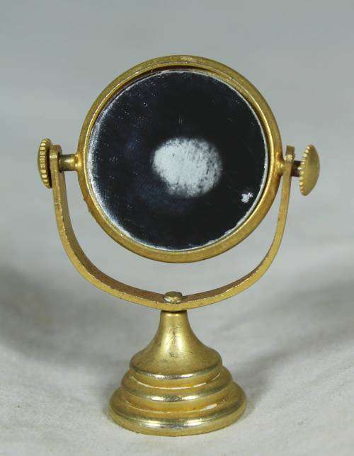 Miniature bronze table swivel mirror