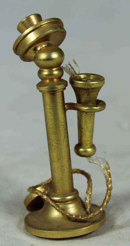 Miniature brass telephone