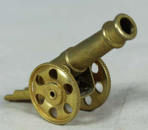 Miniature brass cannon