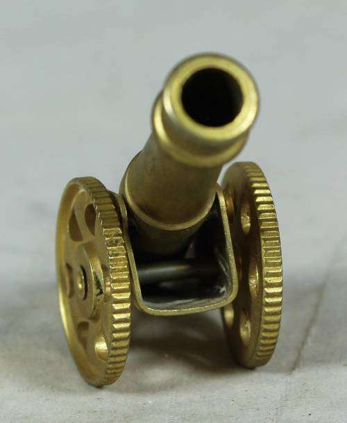 Miniature brass cannon