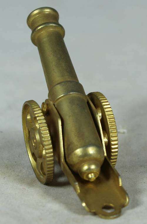 Miniature brass cannon