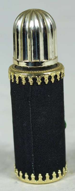 Vintage perfume bottle with needlework body