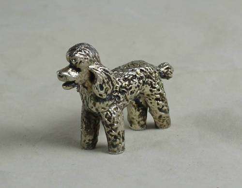 Miniature silver plated lead pooch