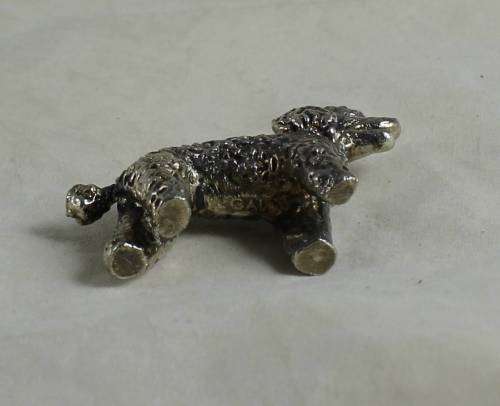 Miniature silver plated lead pooch