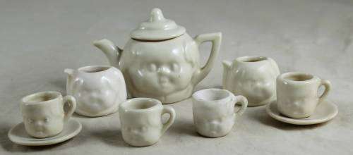 Kids tea set with baby face imprint