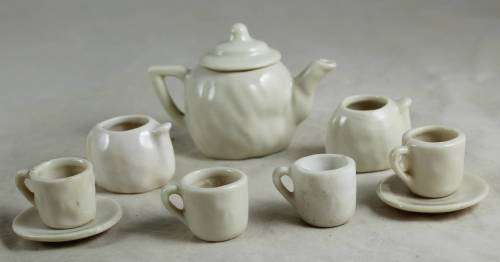 Kids tea set with baby face imprint