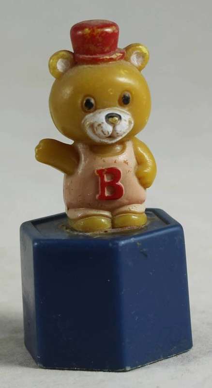 Baby bear on a pedestal