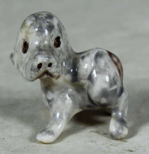 Miniature porcelain puppy