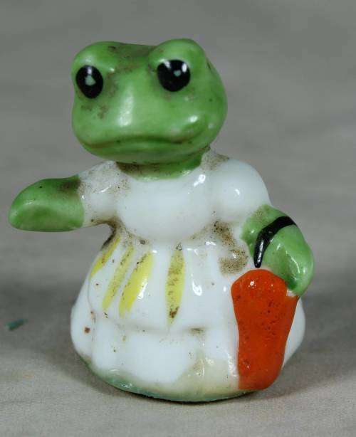 Miniature momma frog