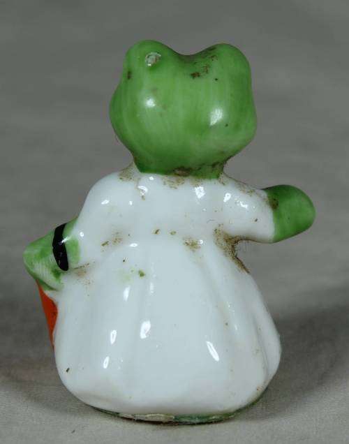 Miniature momma frog