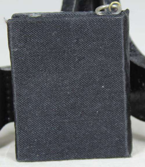 Miniature note book with embezzled covering
