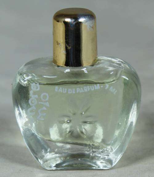 Full bottle of replaced perfume in a Amore Mio bottle 7ML