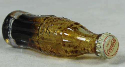 Miniature Coke Bottle - Act fast and bid now!