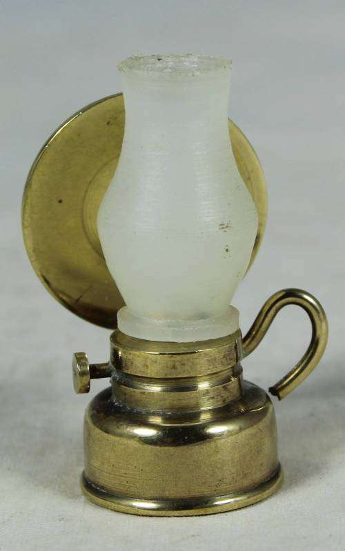 Miniature brass paraffin lamp with reflector
