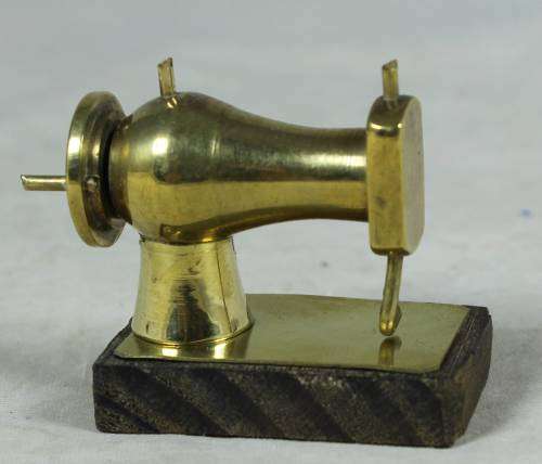 Miniature bass sewing machine