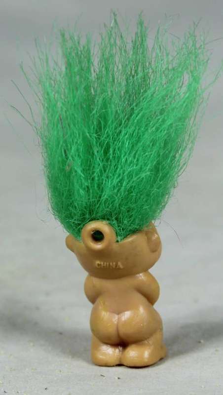 Miniature troll laughing
