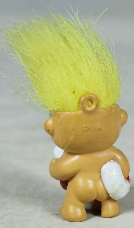 Miniature troll going swimming