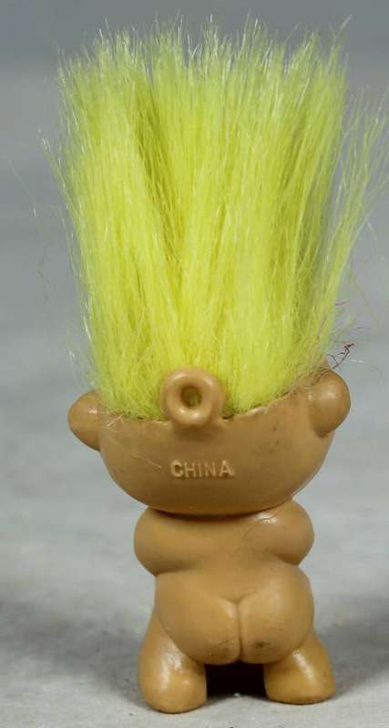 Miniature troll laughing