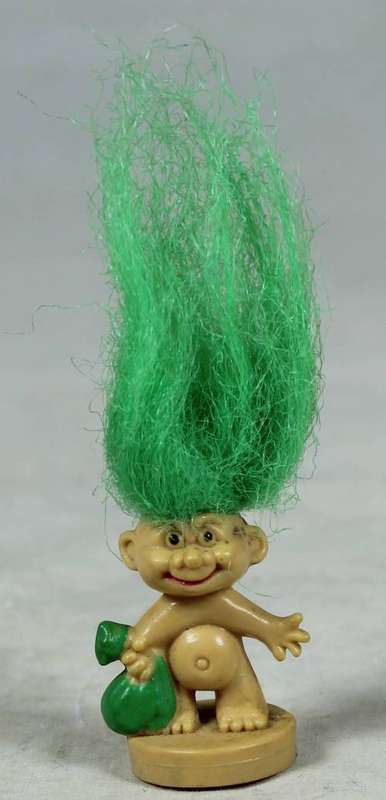 Miniature troll holding a bag