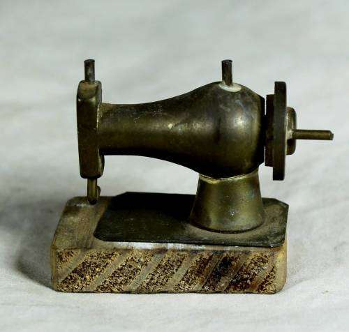 Miniature brass sewing machine