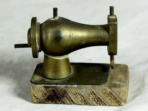 Miniature brass sewing machine