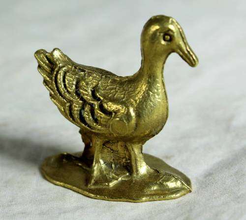 Miniature brass duck