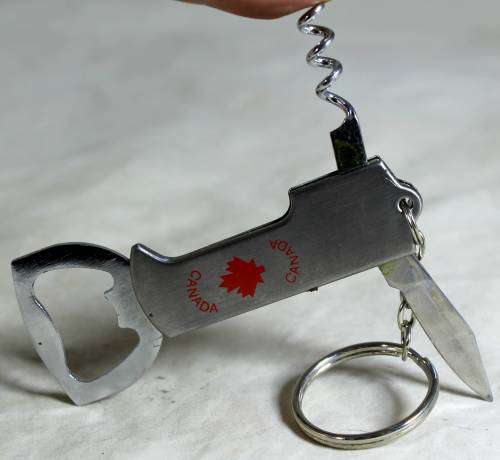 METAL BOTTLE OPENER WITH KNIFE - CANADA - KEY-RING - BID NOW!!!