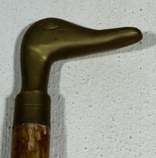 Brass duck head topped wooden cane