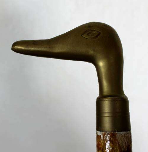 Brass duck head topped wooden cane