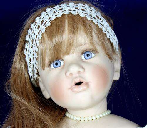 Porcelain doll - Bell Ceramics - Ursula Walters doll - sitting