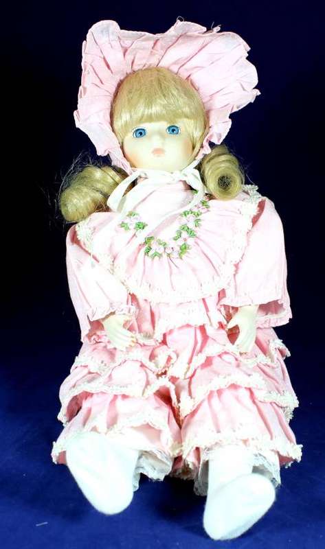 Porcelain doll - girl in pink dress