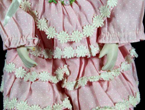 Porcelain doll - girl in pink dress