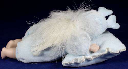 Porcelain doll - baby sleeping on pillow with music box