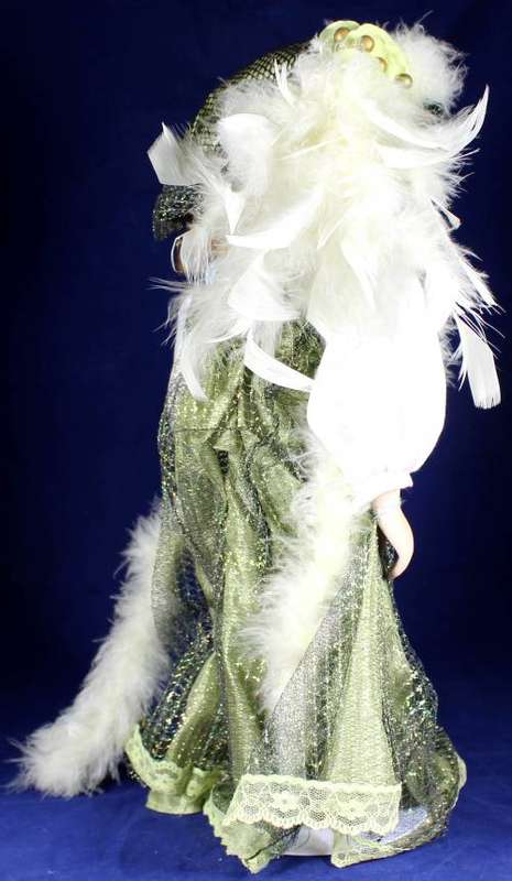 Porcelain doll  Alice in grown up clothes on stand