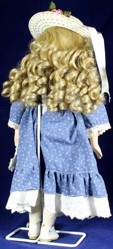 Porcelain doll - country girl on stand