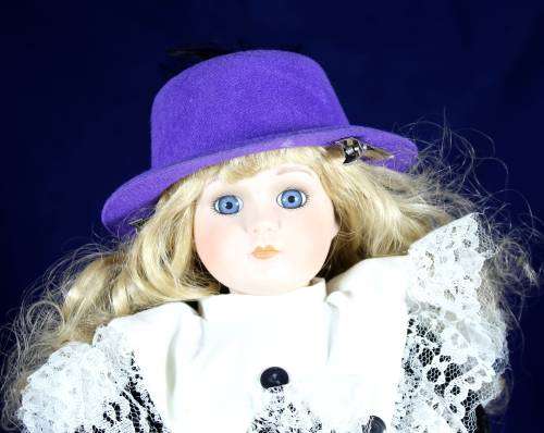 Porcelain doll - Victorian girl on stand