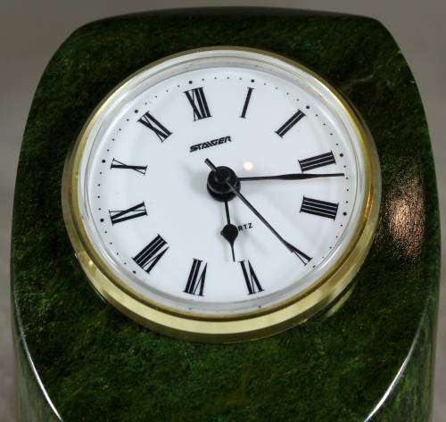 Desk clock mounted in stone
