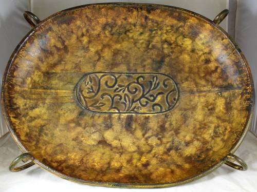 Large hand beated metal tray on stand