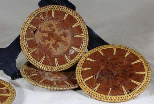 Set of five pottery and braided coasters