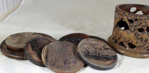 Set of six wooden coasters in container