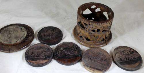 Set of six wooden coasters in container